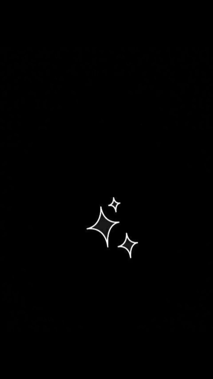 Dvě bílé čtyřcípé hvězdičky na černém pozadí, minimalistický symbolický motiv.